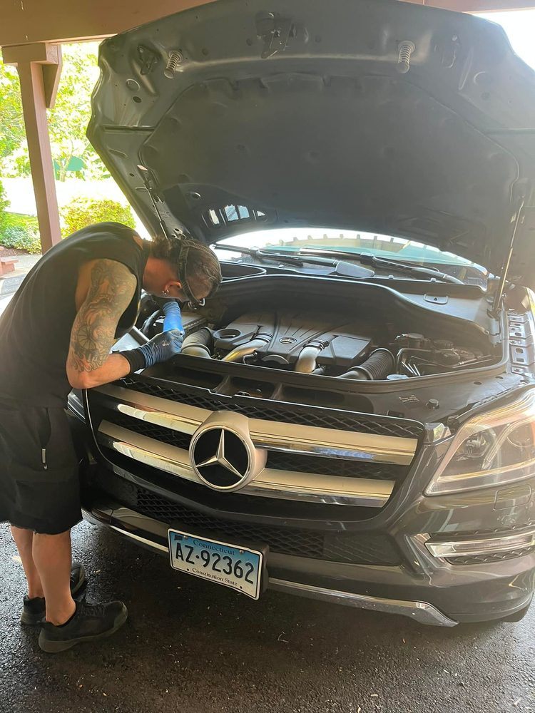 Kirk Kolaitis working on a Mercedes GL engine